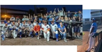 A group of people sitting on a bench
Description automatically generated