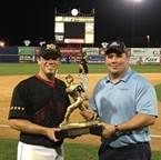 Two men holding a trophy
AI-generated content may be incorrect.