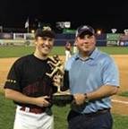 Two men holding a trophy
AI-generated content may be incorrect.